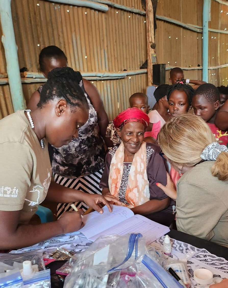 A child receiving medical care through AFR practical support.